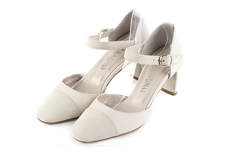French elegance and refinement for these off white dress open side shoes, with an instep strap, 
                available in many subtle leather and colour combinations. Its high vamp and fitted strap will give you good support.
To personalize or not, according to your inspiration and your needs.  
                Matching clutches for parties, ceremonies and weddings.   
                You can customize these shoes to perfectly match your tastes or needs, and have a unique model.  
                Choice of leathers, colours, knots and heels. 
                Wide range of materials and shades carefully chosen.  
                Rich collection of flat, low, mid and high heels.  
                Small and large shoe sizes - Florence KOOIJMAN